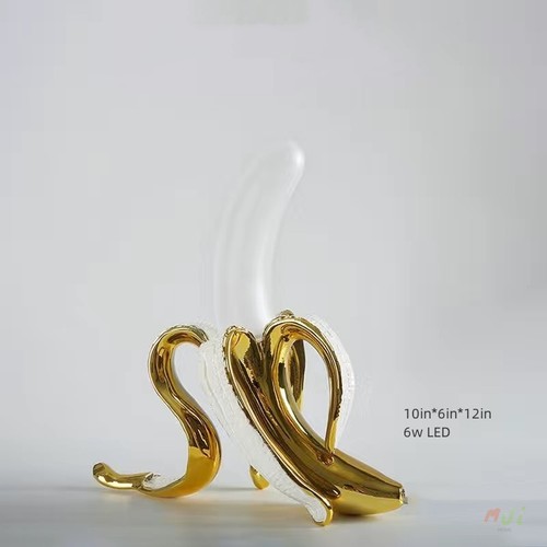 Gold plated banana - banana, table
